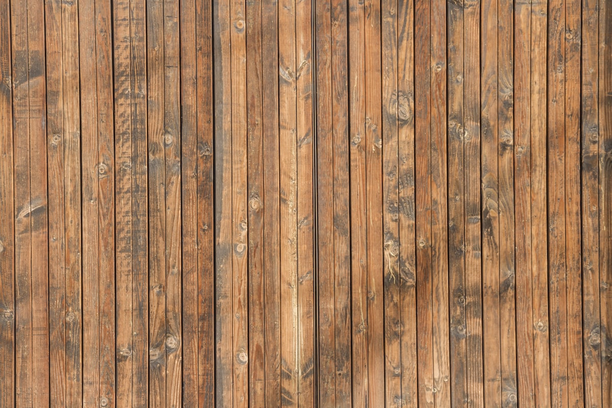 Brush applying wood finish